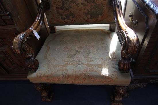 A pair of 19th century French Restauration style parcel gilt and carved beech armchairs, W.2ft 5in. D.2ft 3in. H.4ft 1in.